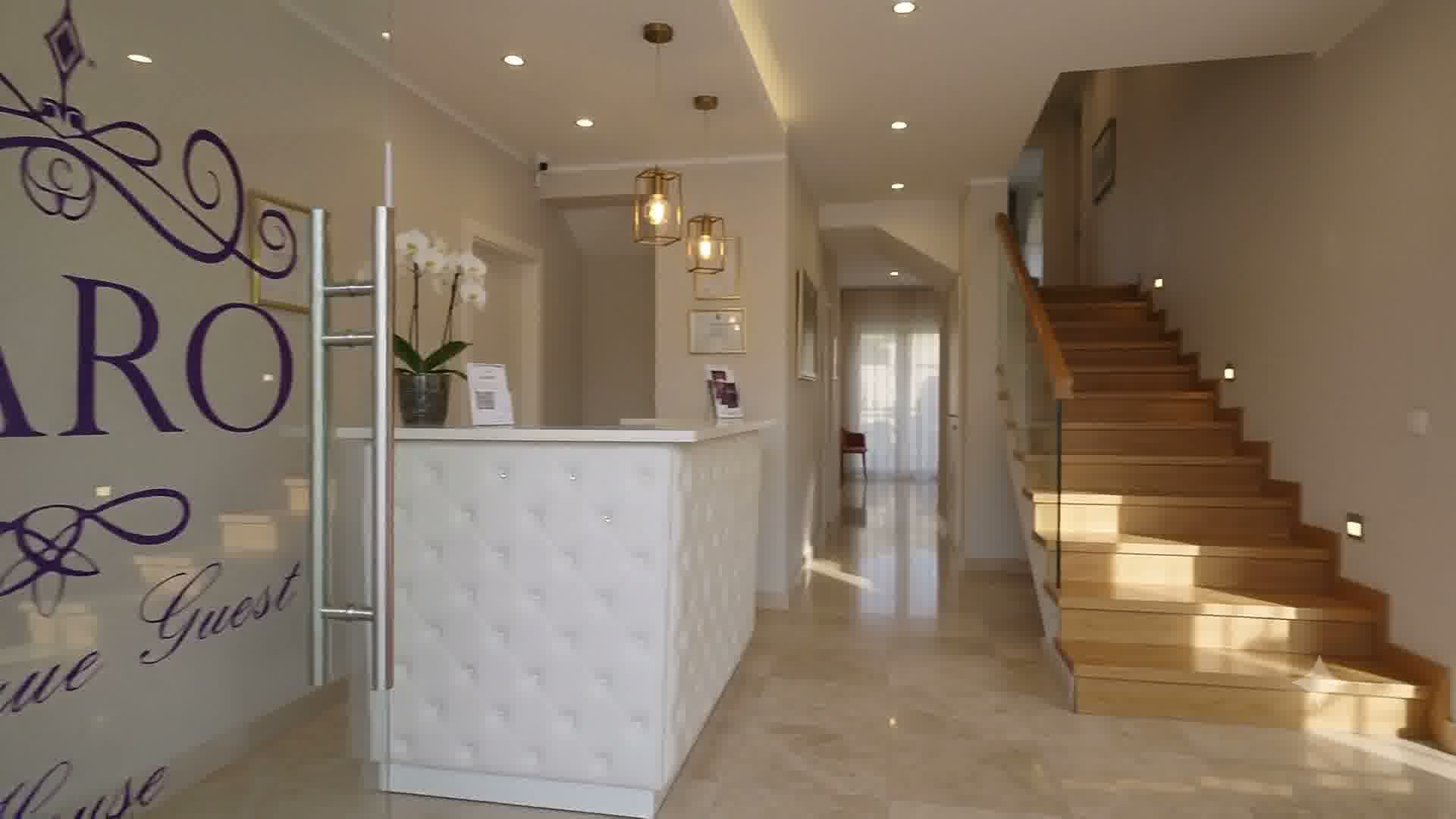 CARO Boutique Guest House reception and staircase