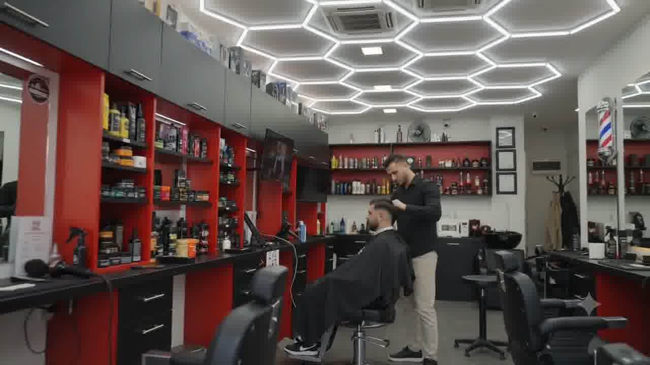 Barber working with a client
