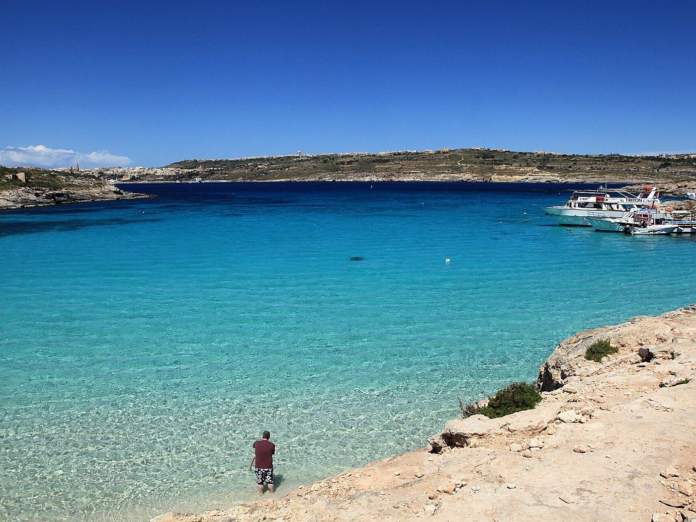 The Blue Lagoon at Comino — turquoise shallows between limestone shores